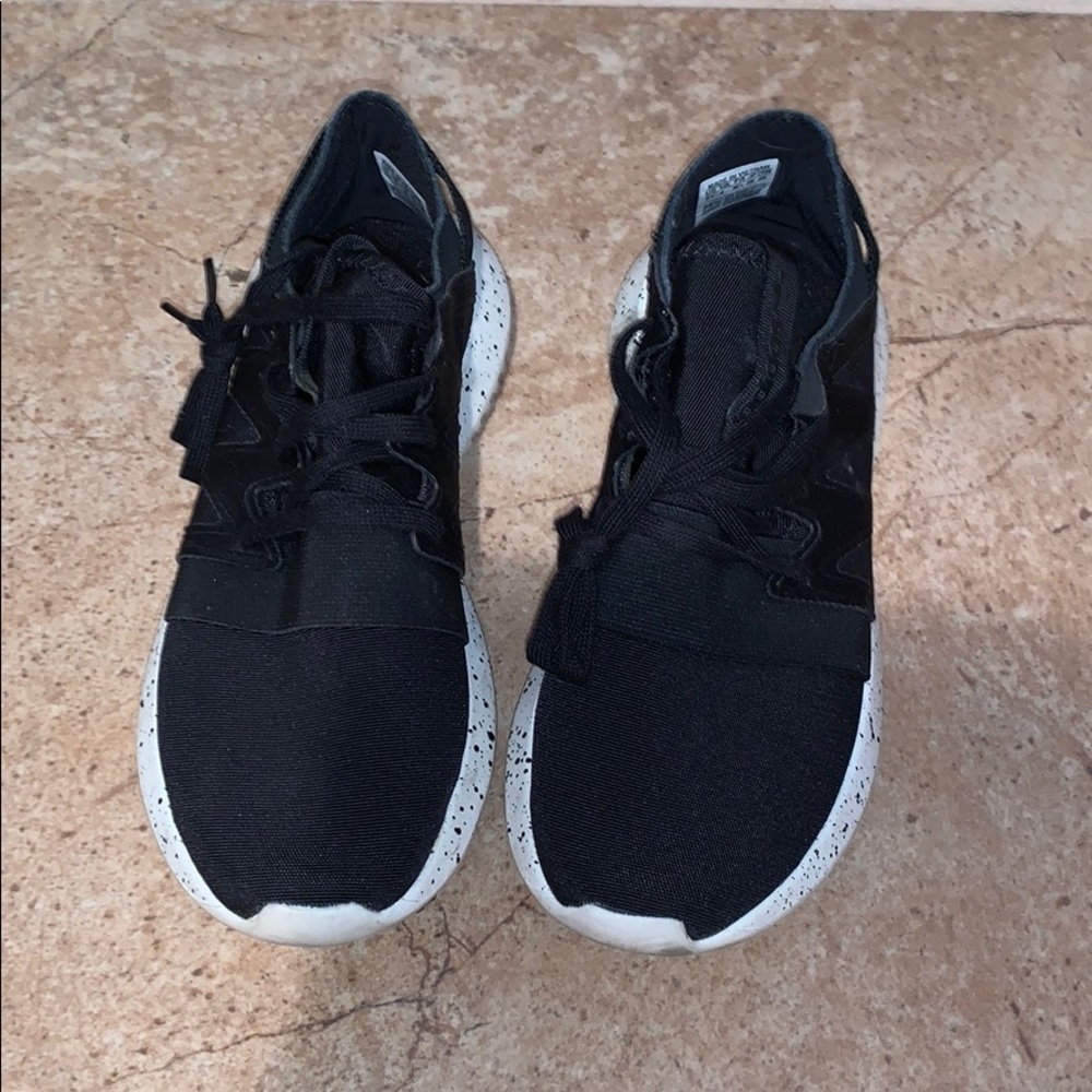 Slightly worn Adidas sneakers in mint condition